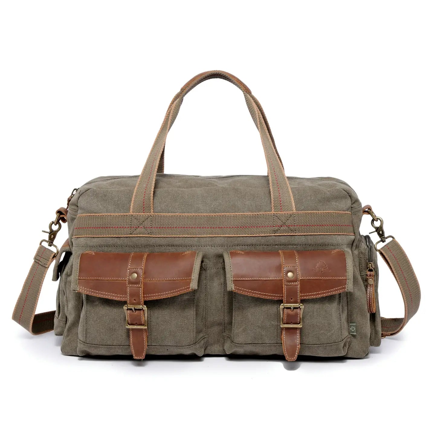 An olive green canvas duffel bag with brown leather accents, featuring two front utility pockets with buckle straps, dual top handles, and an adjustable shoulder strap, shown against a plain white background.